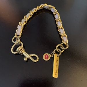 One tan and gold bracelet